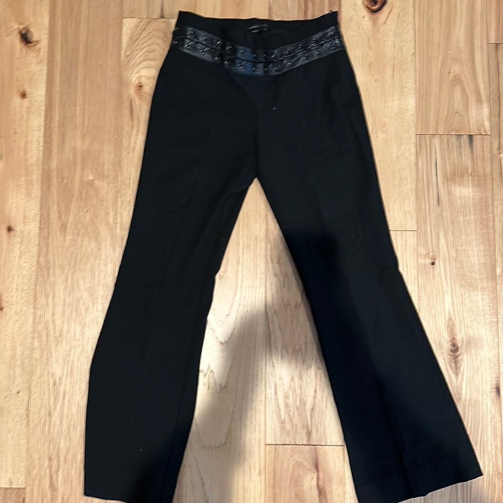 Black BCBG pants with leather detail at the waist.